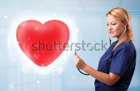 Foto stock: Jovem · enfermeira · cura · vermelho · coração · bastante