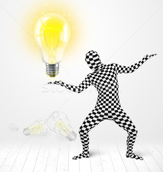 Man in full body with glowing light bulb Stock photo © ra2studio