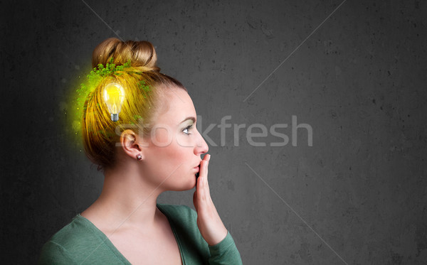 Young mind thinking of green eco energy with lightbulb Stock photo © ra2studio