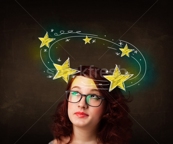 girl with yellow stars circleing around her head illustration Stock photo © ra2studio