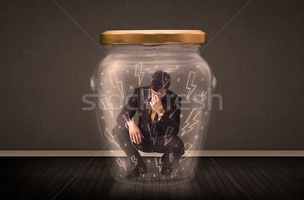 бизнесмен внутри стекла банку Молния Сток-фото © ra2studio