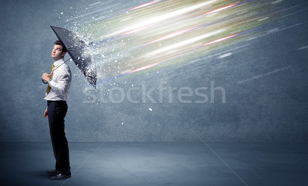 Homme d'affaires lumière parapluie affaires eau travaux [[stock_photo]] © ra2studio