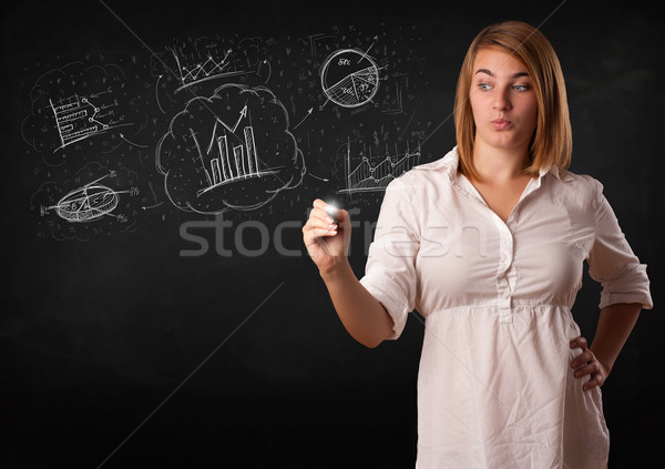 Young lady sketching financial chart icons and symbols Stock photo © ra2studio