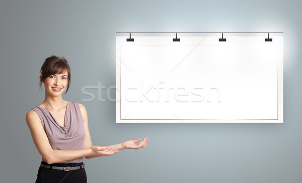 young woman presenting modern copy space Stock photo © ra2studio