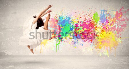 Mutlu genç atlama renkli mürekkep sıçramak Stok fotoğraf © ra2studio