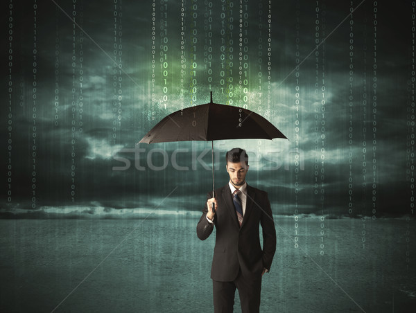 Business man standing with umbrella data protection concept Stock photo © ra2studio