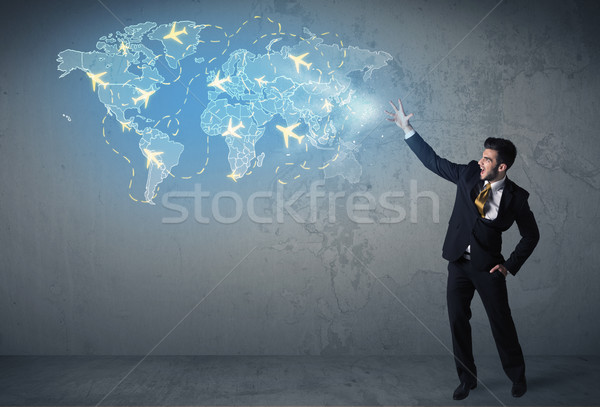 Business person showing digital map with planes around the world Stock photo © ra2studio