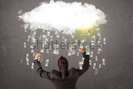 Hombre de negocios traje mirando nube caer dinero Foto stock © ra2studio