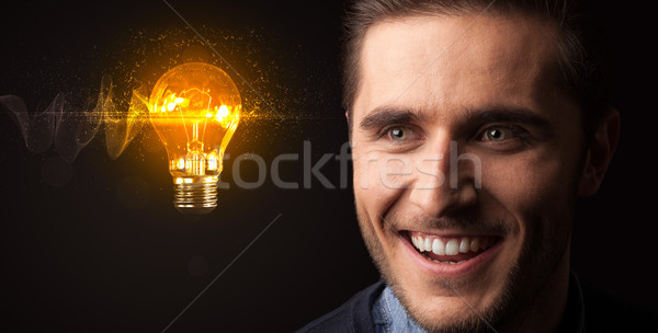 [[stock_photo]]: Portrait · jeunes · affaires · sombre · ampoule · affaires