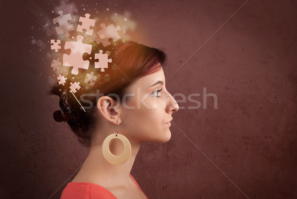 Fiatal személy gondolkodik izzó puzzle elme Stock fotó © ra2studio