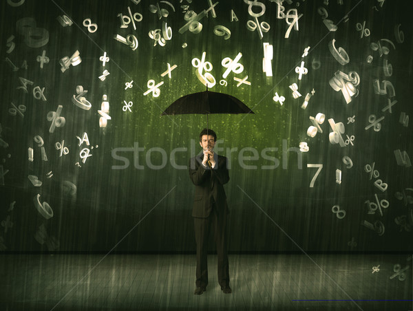 Businessman standing with umbrella and 3d numbers raining concep Stock photo © ra2studio