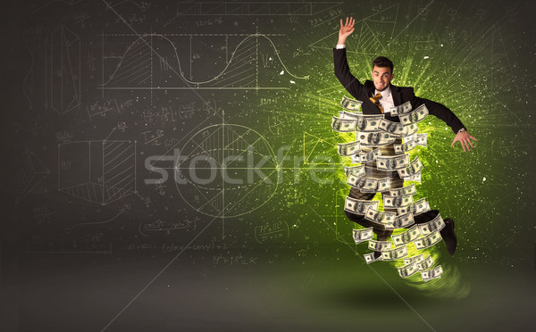 Cheerful businesman jumping with dollar banknotes around him Stock photo © ra2studio