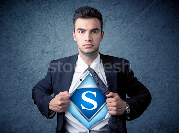 Businessman ripping off his shirt with superhero sign  Stock photo © ra2studio