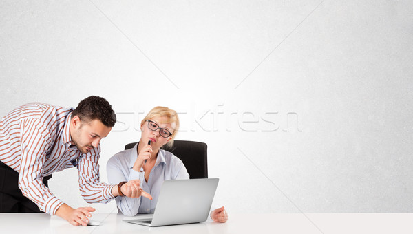 Businessman and businesswoman with plain white copy space Stock photo © ra2studio