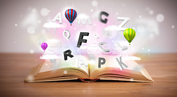 Offenes Buch unter 3D Briefe konkrete farbenreich Stock foto © ra2studio