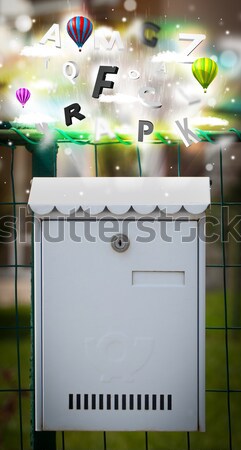 Mail box with letters comming out Stock photo © ra2studio