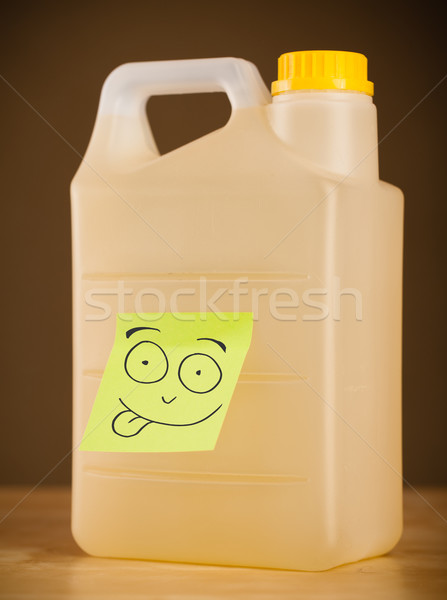 Post-it note with smiley face sticked on a can Stock photo © ra2studio