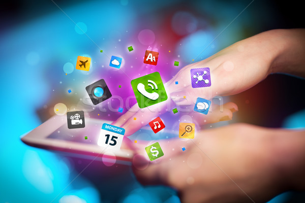 Hand touching tablet pc, social network concept Stock photo © ra2studio