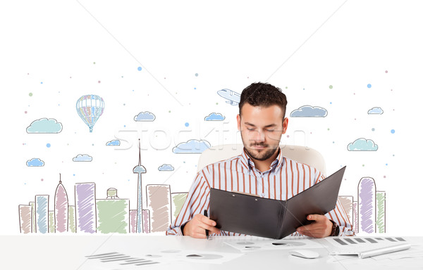 Attractive businessman with city sky-scape background Stock photo © ra2studio