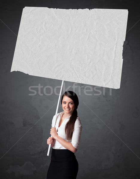 üzletasszony füzet papír fiatal tart nagy Stock fotó © ra2studio