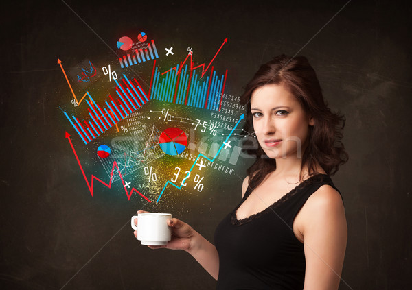 Businesswoman holding a white cup with diagrams and graphs Stock photo © ra2studio