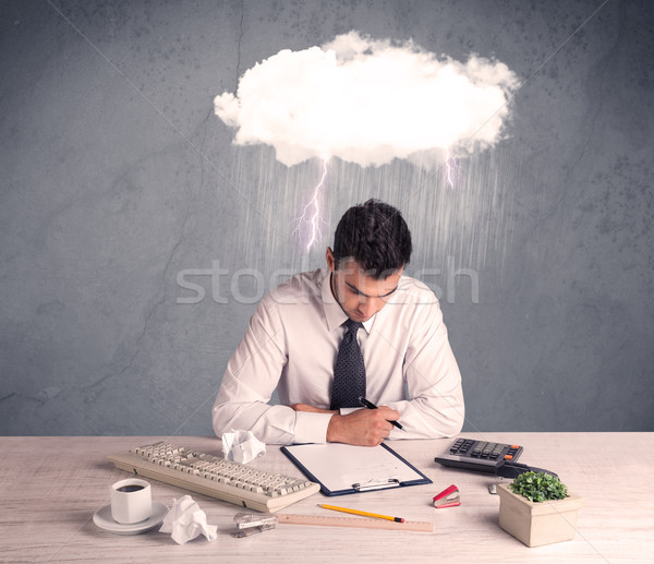 Stressed out businessman at office desk Stock photo © ra2studio