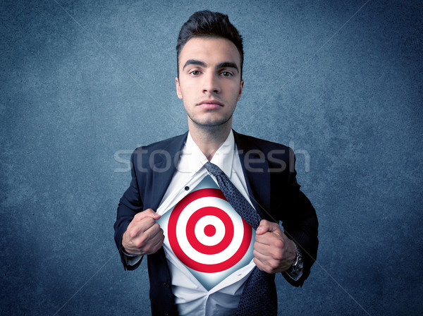 Businessman tearing shirt with target sign on his chest Stock photo © ra2studio