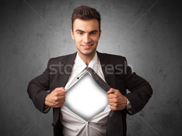 Businessman tearing off his shirt with white copyspace on chest Stock photo © ra2studio