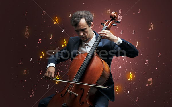 Relevant note classique musicien jeunes violoncelliste Photo stock © ra2studio