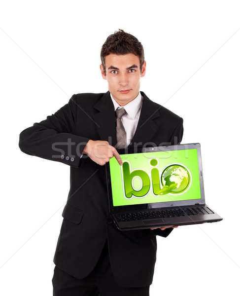 деловой человек указывая ноутбука bio знак изолированный Сток-фото © ra2studio