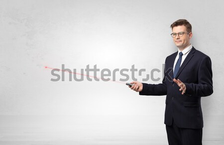 Young man gesturing with copy space Stock photo © ra2studio