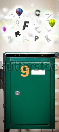 Stock photo: Post box with daily newspapers flying