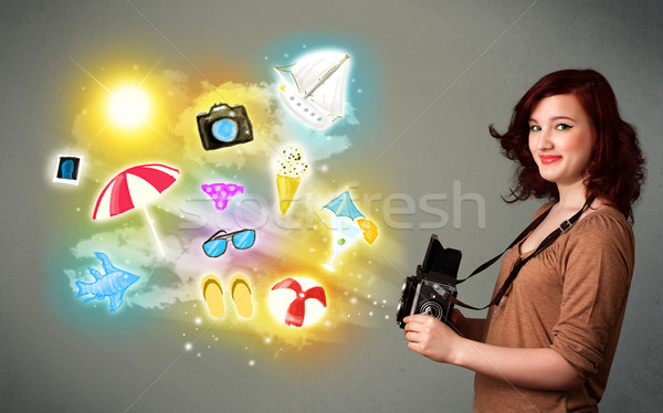 Teenage photographer making photos of holiday painted icons Stock photo © ra2studio