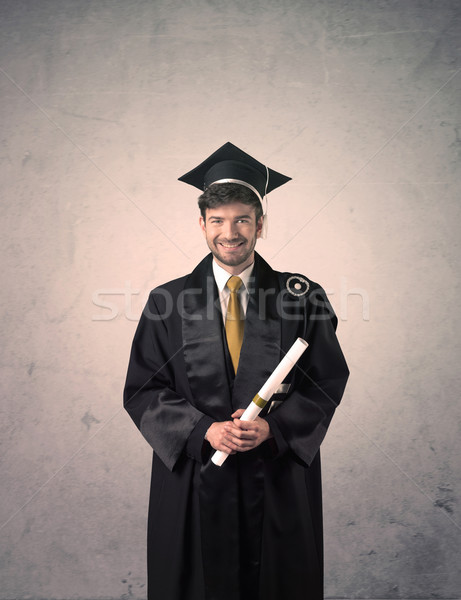 Portrait jeunes diplômé étudiant heureux [[stock_photo]] © ra2studio