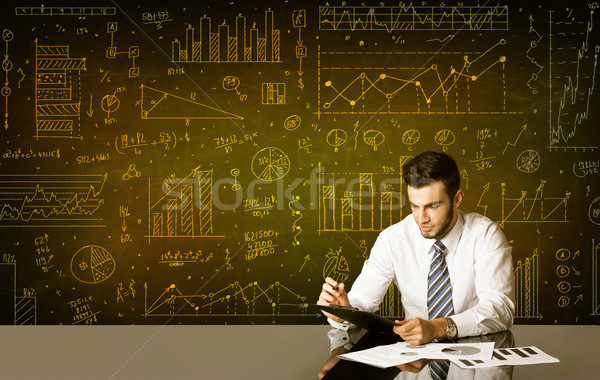 Stock photo: Businessman with diagram background