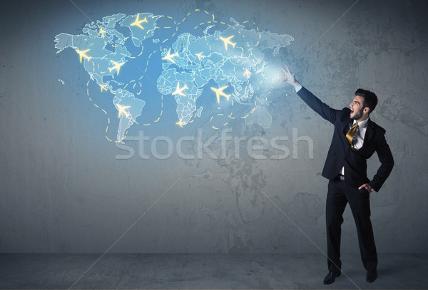 Business person showing digital map with planes around the world Stock photo © ra2studio