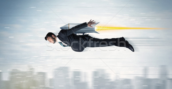 Foto stock: Homem · de · negócios · voador · jato · empacotar · foguete