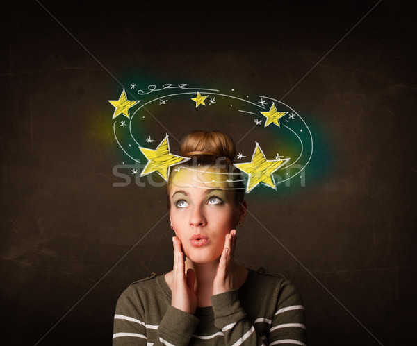 girl with yellow stars circleing around her head illustration Stock photo © ra2studio