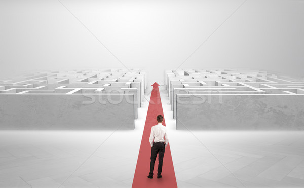 бизнесмен прямой впереди два красный ковер стрелка Сток-фото © ra2studio