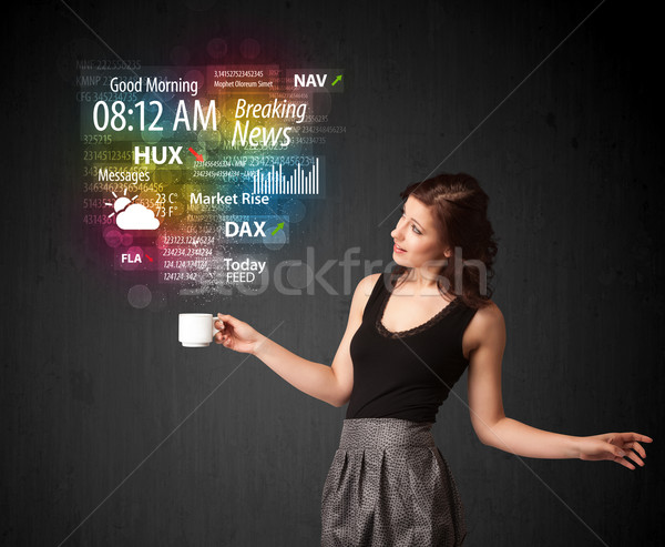 Stock photo: Businesswoman holding a white cup with daily news and informatio