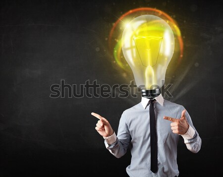 Zakenman lamp houden idee zwarte Stockfoto © ra2studio
