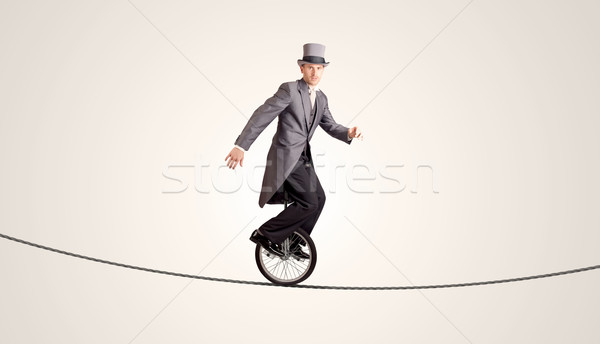 極端な ビジネスマン ライディング 一輪車 ロープ ビジネス ストックフォト © ra2studio