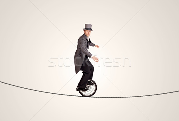 Extreme zakenman paardrijden touw business Stockfoto © ra2studio
