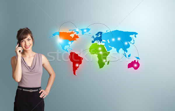 young woman making phone call with colorful world map Stock photo © ra2studio