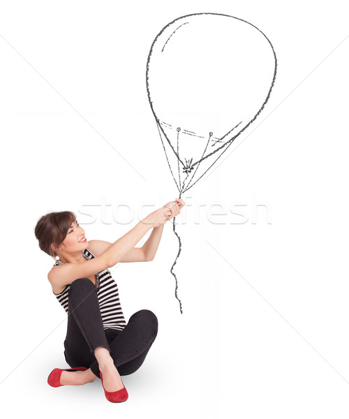 Stock photo: Pretty woman holding balloon drawing