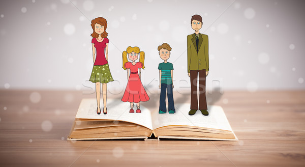 Drawing of a happy family on opened book Stock photo © ra2studio