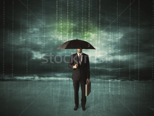 Stock photo: Business man standing with umbrella data protection concept