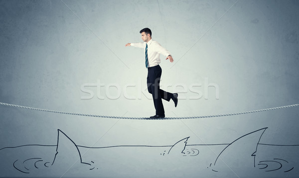 Geschäftsmann Fuß Seil über Haie trotzen Stock foto © ra2studio
