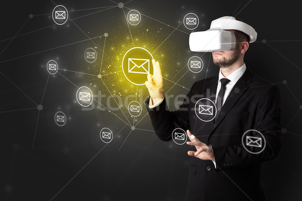 Man in vr goggles and online communication concept Stock photo © ra2studio