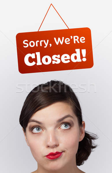 Young girl head looking at closed and open signs Stock photo © ra2studio
